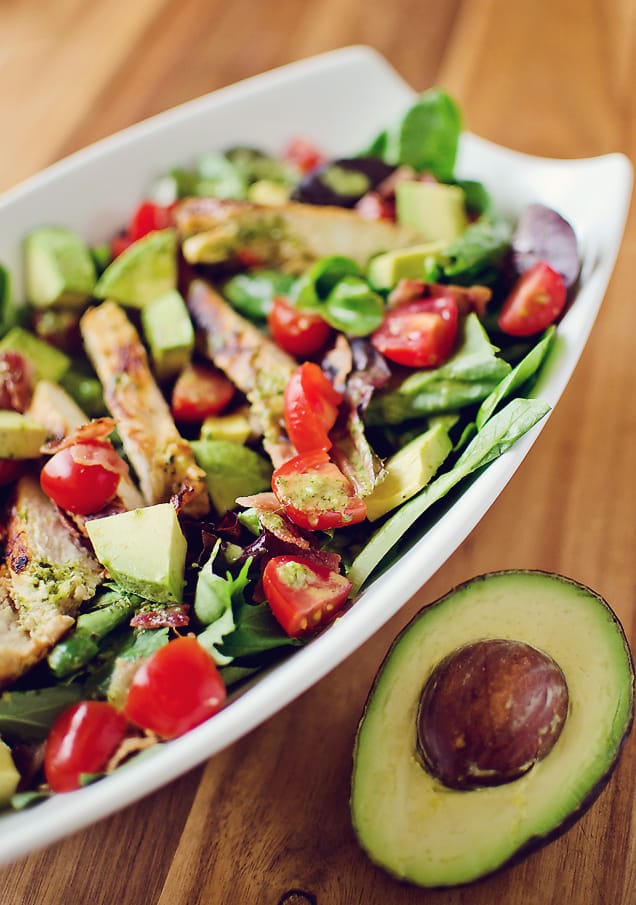 Chicken BLT Salad with Citrus Tomatillo Dressing served with avocado