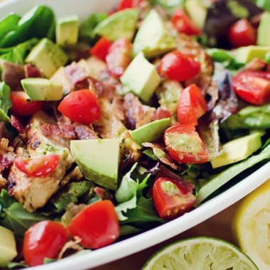 Chicken BLT Salad with Citrus Tomatillo Dressing served in large bowl