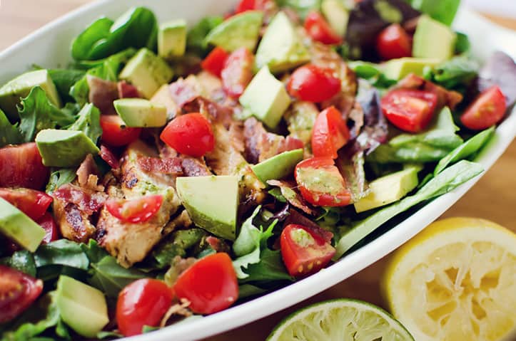 Chicken BLT Salad with Citrus Tomatillo Dressing served in large bowl
