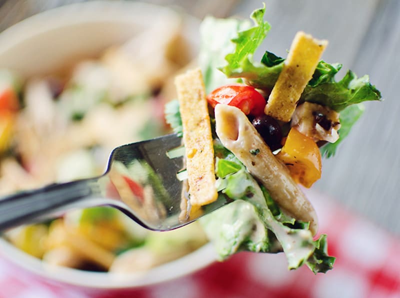 Southwest Penne & Romaine Salad bite on fork