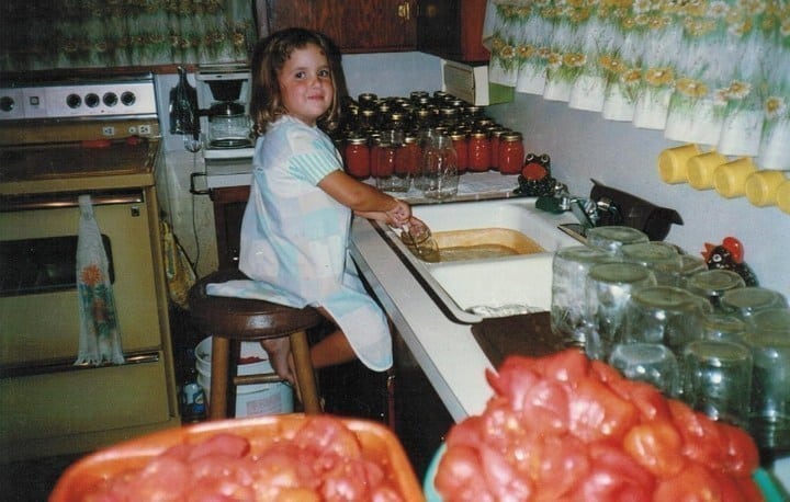 Danielle' canning tomatoes as a child