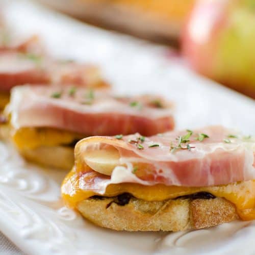 Caramelized Onion & Cheddar Crostinis with Prosciutto Wrapped Apples