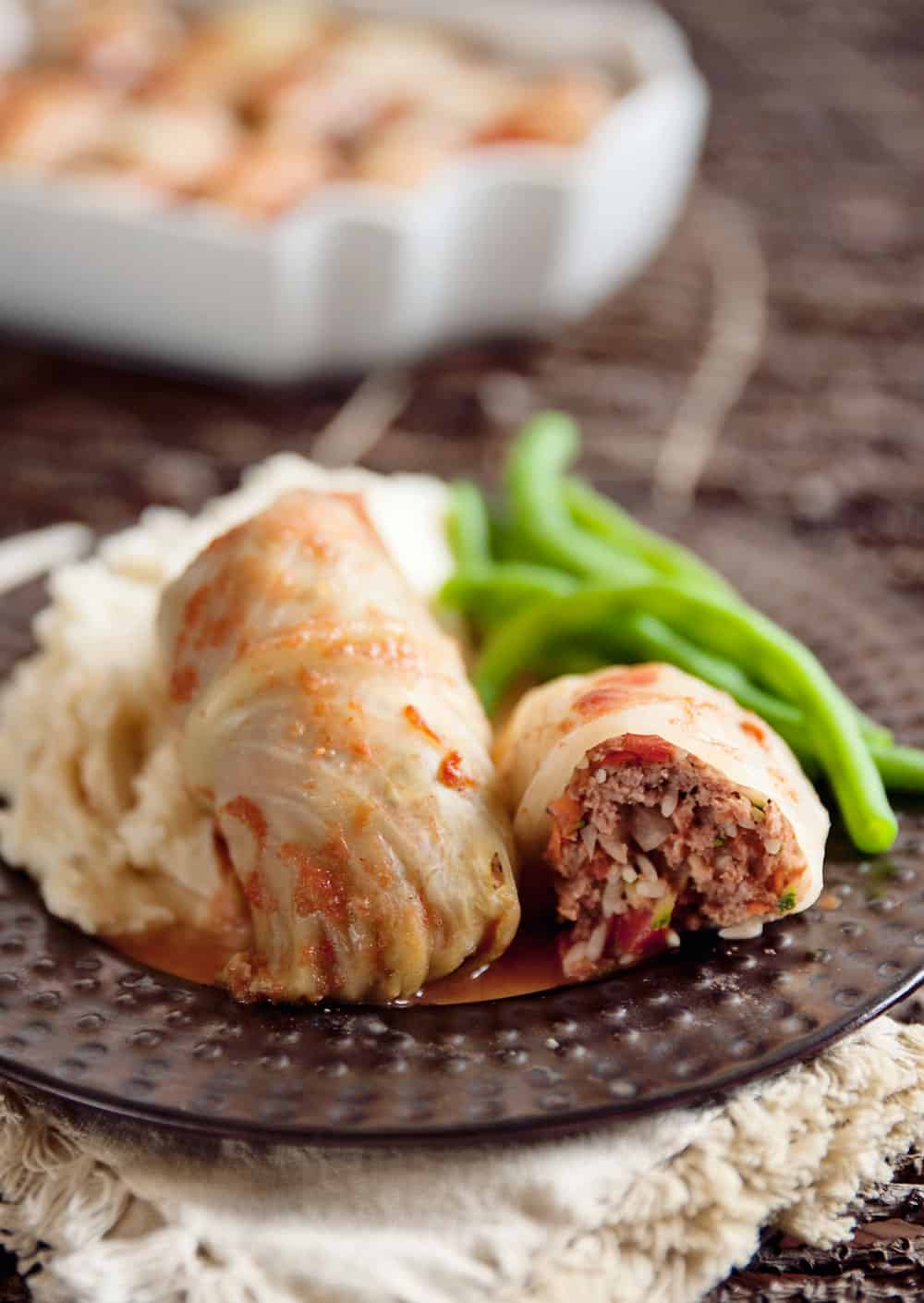 Beef, Rice & Vegetable Stuffed Cabbage Rolls are an old comforting dinner recipe made healthier with the addition of lots of vegetables!