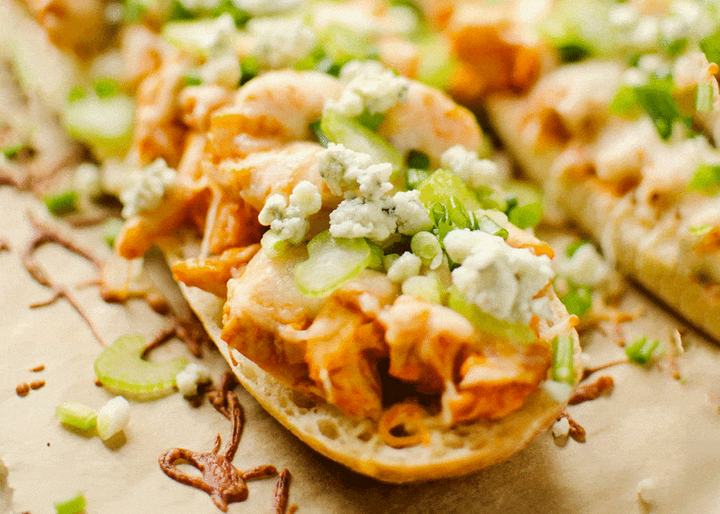 crusty french bread topped with buffalo chicken and cheese