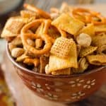 Cheddar Sriracha Snack Mix - Krafted Koch - An easy snack mix recipe loaded with spice and flavor! #snackmix #spicy #cheddar