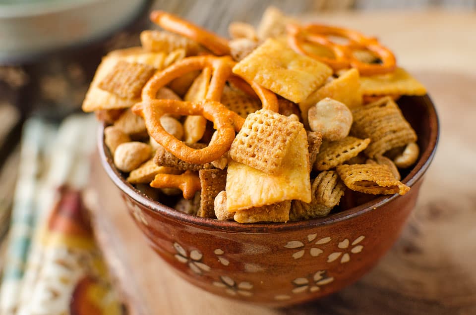 Cheddar Sriracha Snack Mix - Krafted Koch - An easy snack mix recipe loaded with spice and flavor! #snackmix #spicy #cheddar