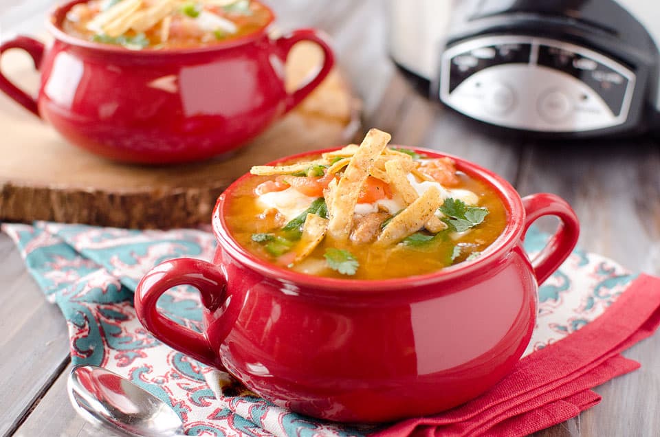 Crock Pot Chicken Tortilla Soup - Krafted Koch - A flavorful and healthy soup recipe make in your slow cooker. 