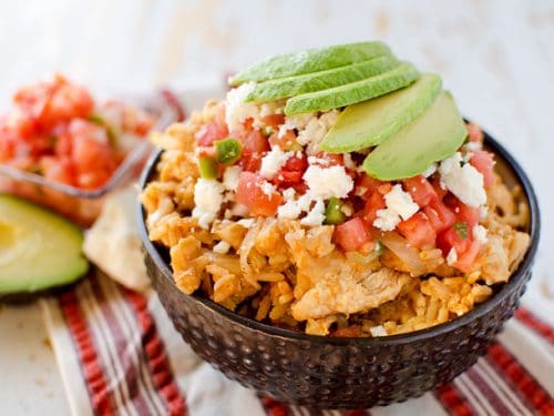 Light Crock Pot Fiesta Chicken & Rice Bowls - An easy weeknight dinner recipe, loaded with bold Mexican flavor, made in your slow cooker.