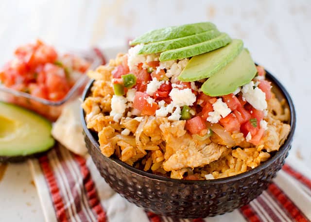 Light Crock Pot Fiesta Chicken & Rice Bowls - An easy weeknight dinner recipe, loaded with bold Mexican flavor, made in your slow cooker. 