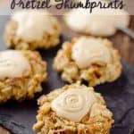 Salted Caramel Pretzel Thumbprint Cookies - Krafted Koch - A fantastic cookie recipe that will impress your guests with a dense, but moist cookie rolled in crunchy pretzels and topped with rich salted caramel frosting!