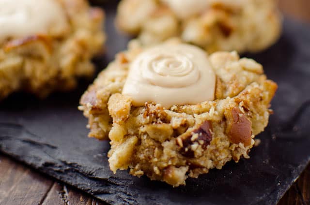 Salted Caramel Pretzel Thumbprint Cookies - Krafted Koch - A fantastic cookie recipe that will impress your guests with a dense, but moist cookie rolled in crunchy pretzels and topped with rich salted caramel frosting!