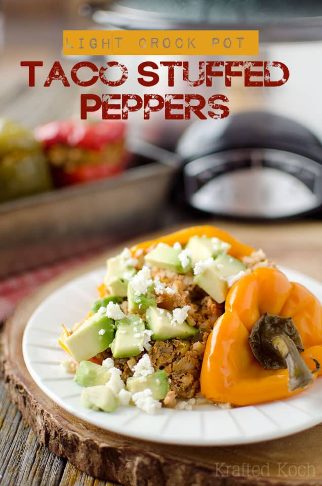 Light Crock Pot Taco Stuffed Peppers - Krafted Koch - An amazingly simple stuffed pepper recipe made in your slow cooker for a healthy dinner idea. #StuffedPeppers #Healthy #Dinner