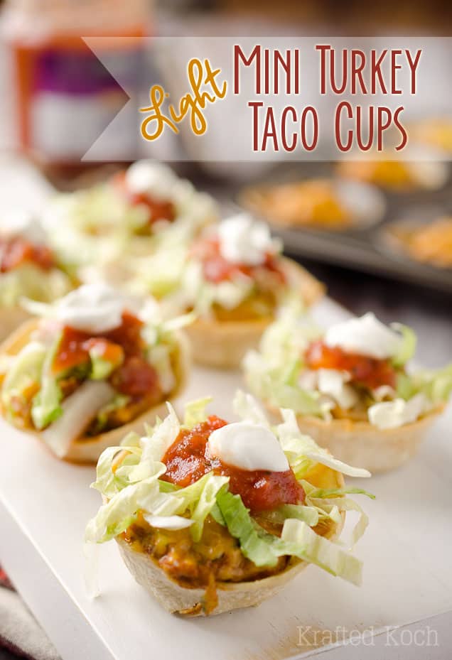 Light Mini Turkey Taco Cups - Krafted Koch - Tortilla cups filled with taco seasoned turkey and topped with lettuce, salsa and sour cream for the perfect healthy appetizer recipe! #Healthy #Appetizer #Light #Lunch