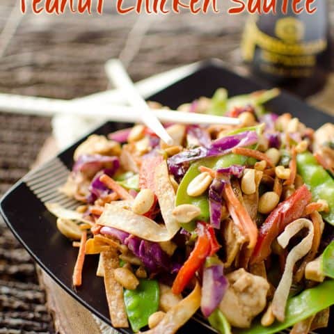 Light Wonton & Thai Peanut Chicken Sautee is a healthy and delicious dinner recipe loaded with vegetables, chicken and a spicy Thai peanut and coconut milk sauce. - Krafted Koch #Healthy #Asian #Recipe