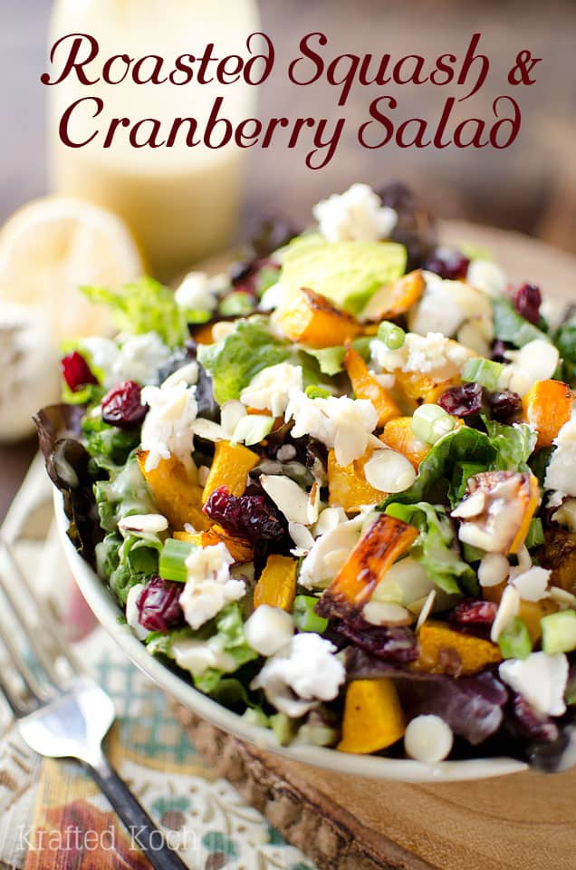 Roasted Squash & Cranberry Salad is a flavorful vegetarian salad loaded with roasted butternut squash, creamy goat cheese, crunchy almonds and dried cranberries with a homemade Roasted Garlic & Lemon Dressing for a healthy dinner that will satisfy all your senses! #Salad #Healthy #Harvest #Vegetarian