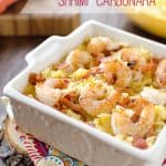 Light Spaghetti Squash Shrimp Carbonara is a healthy and low-carb recipe with all of the great flavors of carbonara without all the fat and carbohydrates from the traditional pasta dish. The lightened up version is loaded with tender shrimp and creamy spaghetti squash for a dinner you can feel good about. #SpaghettiSquash #Shrimp #LowCarb #Light