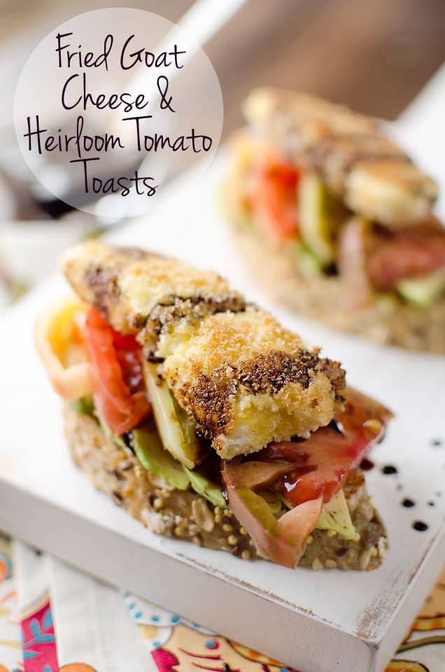 Fried Goat Cheese & Heirloom Tomato Toasts - An amazing meal you can enjoy for breakfast, lunch or dinner. This vegetarian recipe is loaded with fried goat cheese, heirloom tomatoes, avocados and balsamic reduction for a fresh meal bursting with flavor. #Vegetarian #Breakfast #Lunch #Dinner