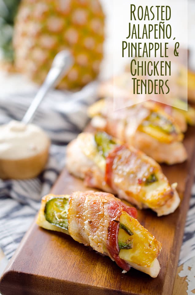 Roasted Jalapeno, Pineapple & Chicken Tenders - Juicy pieces of chicken breast wrapped up with a slice of jalapeno and pineapple in a flavorful piece of bacon served with a spicy szechuan Greek yogurt sauce. These make a great appetizer recipe or a fun and healthy dinner idea! #Chicken #Bacon #Light #Healthy