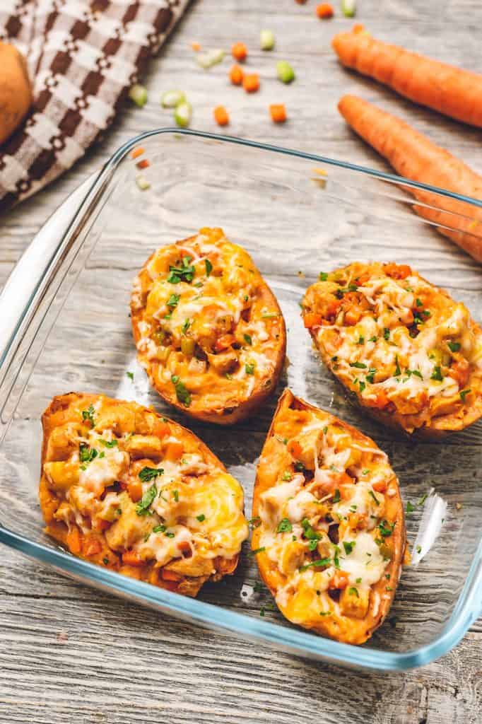 twice baked buffalo chicken sweet potatoes in baking dish