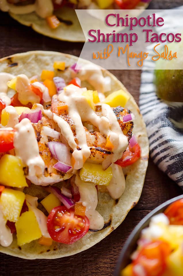 Chipotle Shrimp Tacos with Mango Salsa - A fresh and delicious dinner recipe that can easily be whipped up in 15 minutes for a meal bursting with fresh fruit and vegetables topped with a spicy chipotle sauce. #Tacos #Healthy #Light #DInnerIdea