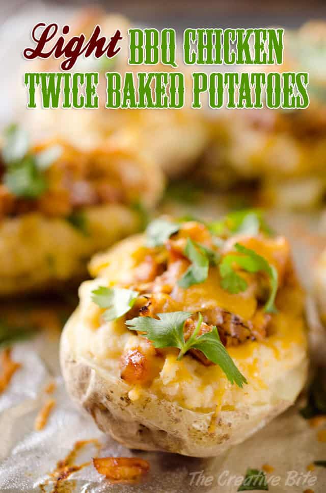 BBQ Chicken Twice Baked Potatoes are a healthy but hearty meal that will have everyone singing your praises. Creamy mashed potatoes with fat free Greek yogurt are topped with BBQ chicken and cheese for a delicious and easy dinner idea.  #Light #Healthy #Chicken #TwiceBakedPotatoes #GreekYogurt