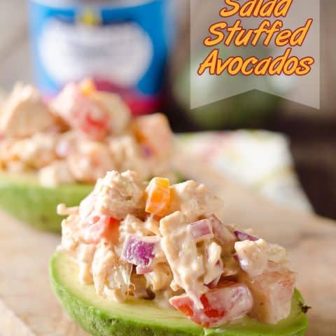 Chipotle Chicken Salad Stuffed Avocados are low-carb recipe full of fresh vegetables and flavor from a spicy chipotle sauce for a light and healthy packed lunch or dinner idea! #LowCarb #Healthy #LunchIdea #Light #Chicken #Easy #ChickenSalad