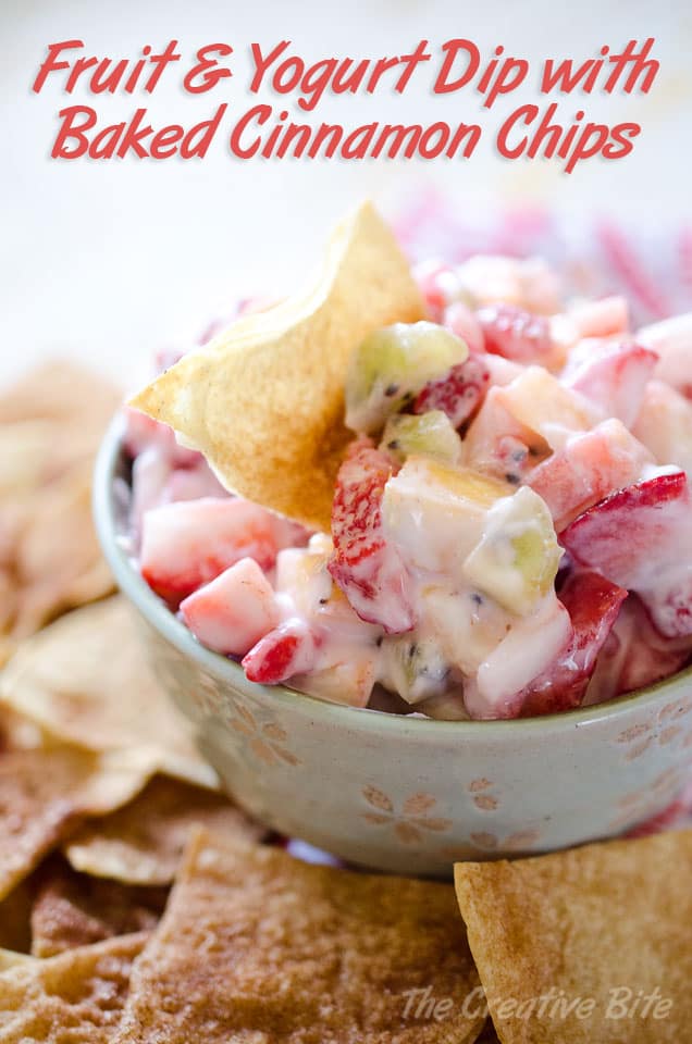 Fruit & Yogurt Dip with Baked Cinnamon Sugar Chips - A creamy mix of Greek yogurt and fresh fruit scooped up with homemade corn tortilla chips sprinkled with cinnamon and sugar for a sweet snack you can feel good about! #Healthy #Light #BakedChips #Fruit #GreekYogurt