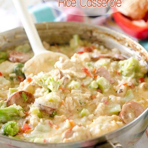 Light Cheesy Chicken, Sausage & Rice Casserole - A creamy chicken and rice bake filled with vegetables and lightened up for a healthy and filling one-pot dinner! #Light #Healthy #chicken #Sausage #Rice #Cheesy