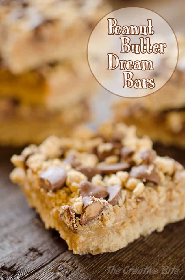 Peanut Butter & Chocolate Dream Bars - A rich dessert loaded with creamy peanut butter and topped with a chocolate and oatmeal crumble for an easy and decadent bar that will disappear in no time! #PeanutButter #Bars #Dessert #Sweet