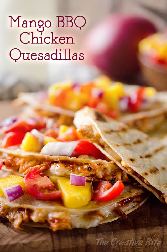 Mango BBQ Chicken Quesadillas are an easy dinner idea bursting with bold flavors from homemade Mango BBQ Sauce and topped with fresh Mango Salsa #Mango #Chicken #Quesadilla #Easy