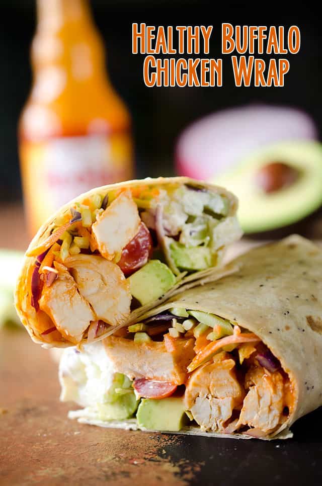 Healthy Buffalo Chicken Wrap - A light and healthy wrap filled with buffalo chicken breasts, Greek yogurt, bleu cheese crumbles, broccoli slaw, avocado and tomatoes for an easy lunch with bold flavor! #Buffalo #Chicken #Wrap #Lunch #Healthy #Light