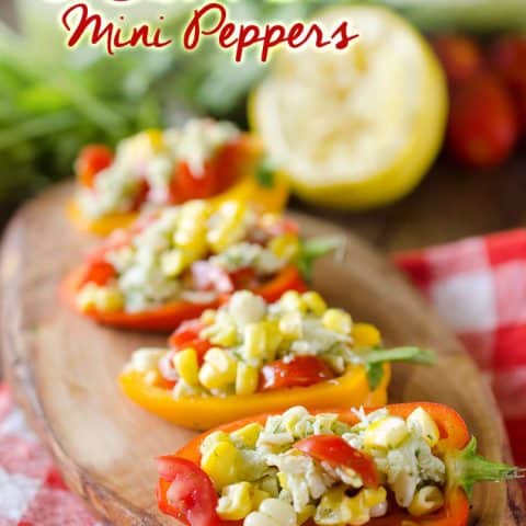 Cilantro Crab & Sweet Corn Mini Peppers are little bites of summer goodness with crab, sweet corn and tomatoes tossed in a refreshing Cilantro Lemon Vinaigrette for a light and healthy appetizer or snack. #Appetizer #Healthy #Snack #Light #Crab