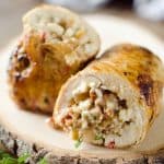 Chicken, Bacon & Feta Roulade is a surprisingly simple dinner idea made with a tender chicken breast wrapped around a bacon, feta, thyme and caramelized onions. #Chicken #Roulade