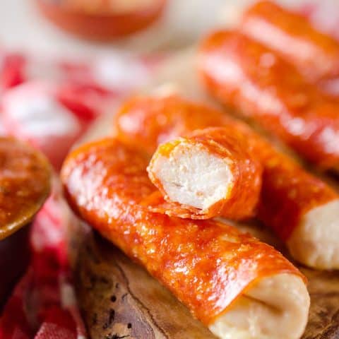 Pepperoni Chicken Fingers with pizza sauce are a healthy and wholesome snack or meal for both kids and adults. With only 3 ingredients, this easy meal or appetizer comes together in less than 30 minutes!#Pepperoni #Chicken #Healthy #GlutenFree #DairyFree
