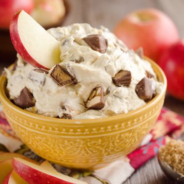 Candy Bar Apple Dip is the perfect dessert recipe to use up all of that leftover Halloween candy! #Candy #Apples #Dip #Dessert