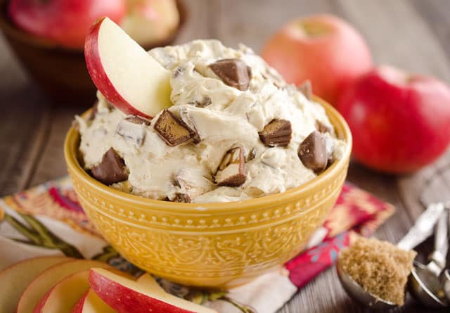 Candy Bar Apple Dip is the perfect dessert recipe to use up all of that leftover Halloween candy! #Candy #Apples #Dip #Dessert