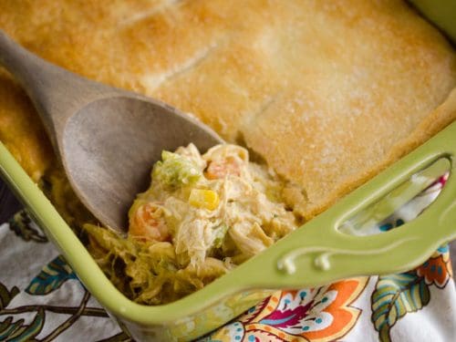 Cheesy Chicken Pot Pie Casserole is a quick and easy weeknight dinner idea with only 5 ingredients! Creamy chicken and vegetables with Campbell's Cheddar Broccoli Chicken Oven Sauce are topped with a flaky crescent crust for a delicious recipe the whole family will love!