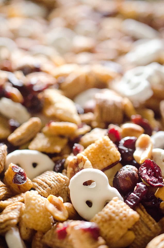 Sweet & Salty Cranberry Snack Mix is a party favorite filled with buttery cinnamon Chex Mix, yogurt covered pretzels, dried cranberries and mixed nuts. 