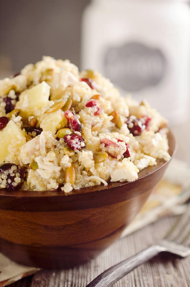 Harvest Chicken Quinoa Salad is a healthy and delicious lunch studded with chewy cranberries, juicy pineapple and salty pumpkin seeds along with the tender chicken & protein packed quinoa that are dressed in a homemade pineapple and honey vinaigrette. #Quinoa #Salad #Chicken