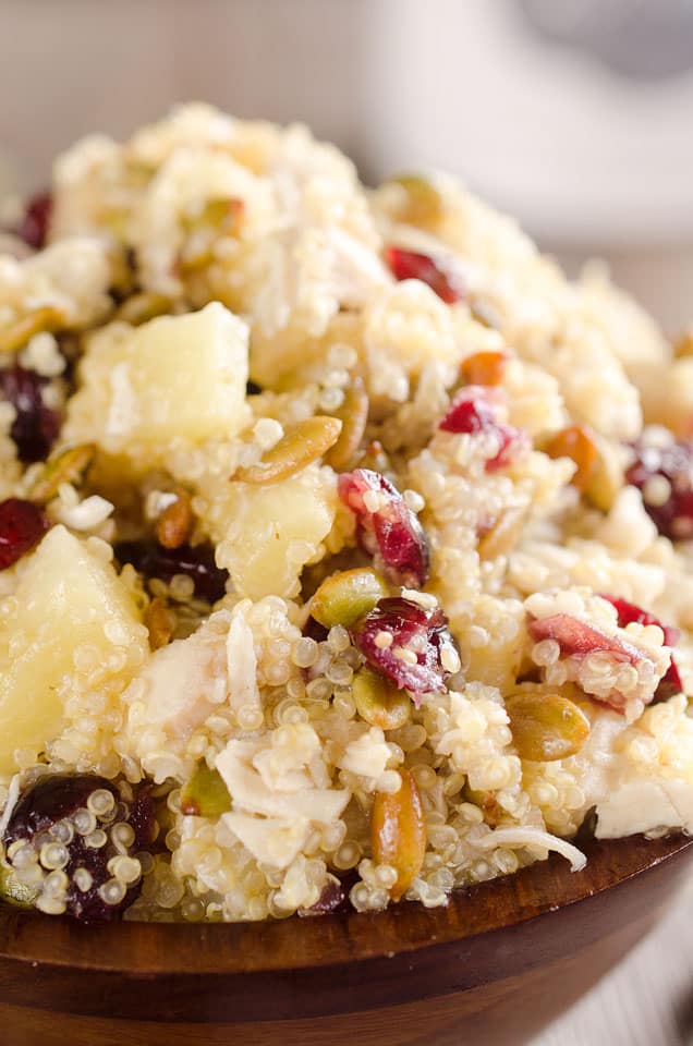 Harvest Chicken Quinoa Salad is a healthy and delicious lunch studded with chewy cranberries, juicy pineapple and salty pumpkin seeds along with the tender chicken & protein packed quinoa that are dressed in a homemade pineapple and honey vinaigrette. #Quinoa #Salad #Chicken