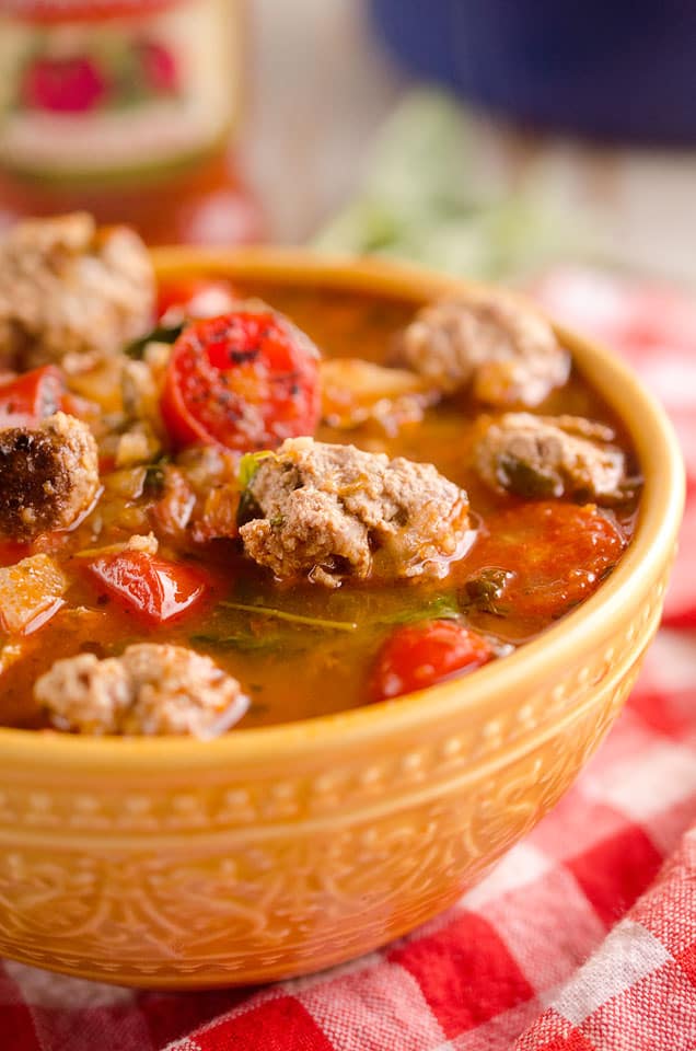 Light Tomato Basil Meatball Soup is a hearty and healthy dinner filled with lean meatballs and fresh tomatoes and basil and will leave you feeling warmed up and satisfied! #Meatball #Soup #Healthy