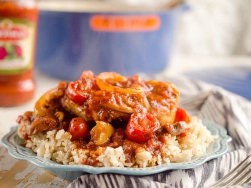 Rustic Italian Chicken Cacciatore is a hearty comfort food, made with Bertolli tomato & basil sauce, red wine and loads of vegetables. Served over brown rice, it is a dinner the whole family will love and you can feel good about! #Chicken #Italian #Rustic #Bertolli #Healthy #TasteOfItaly