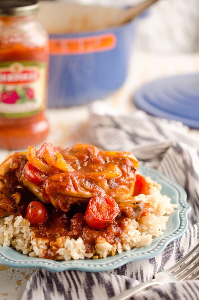 Rustic Italian Chicken Cacciatore is a hearty comfort food, made with Bertolli tomato & basil sauce, red wine and loads of vegetables. Served over brown rice, it is a dinner the whole family will love and you can feel good about! #Chicken #Italian #Rustic #Bertolli #Healthy #TasteOfItaly