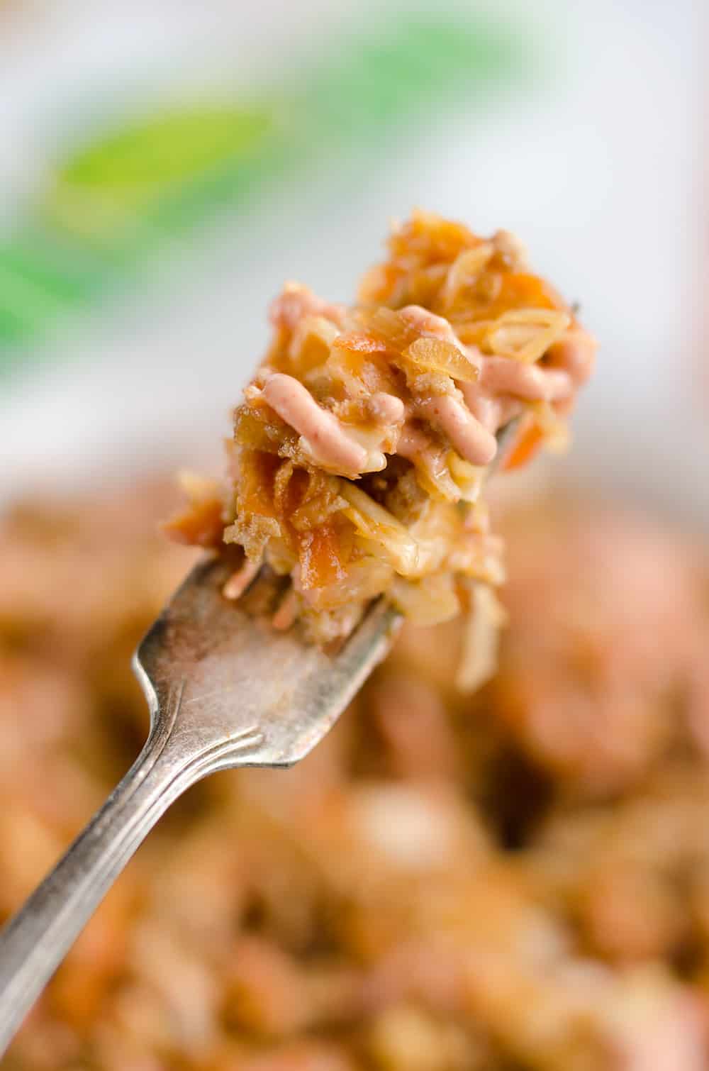 Turkey Egg Roll Bowl with Creamy Sriracha is an amazingly healthy and delicious bowl of goodness perfect for lunch or dinner! Sauteed cabbage, carrots, onion and ground turkey are tossed with an Asian inspired sauce and topped with a creamy Greek yogurt sriracha mayo sauce.