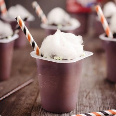 Witch's Brew Pudding Cups - These witch's cauldrons are made with delicious chocolate Snack Packs topped with crushed oreos, bubble sprinkles and cotton candy for a spooky Hallooween treats that kids and adults will all love! #Halloween #Pudding #Chocolate