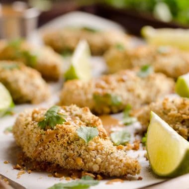 Light Thai Peanut Chicken Tenders are a healthy dinner idea bursting with bold and spicy Thai peanut flavors, paired with a simple two-ingredient sauce with creamy coconut milk!