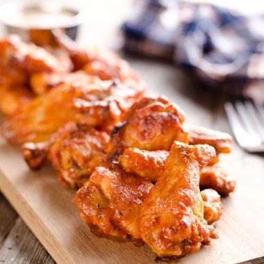 Baked Chipotle Ranch Wings are spicy chicken wings baked to crispy perfection in the oven with a dusting of Hidden Valley Ranch seasoning. These crispy wings are tossed in a delicious chipotle ranch sauce for a a lightened up game day favorite!