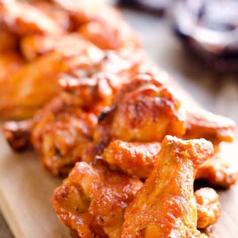 Baked Chipotle Ranch Wings are spicy chicken wings baked to crispy perfection in the oven with a dusting of Hidden Valley Ranch seasoning. These crispy wings are tossed in a delicious chipotle ranch sauce for a a lightened up game day favorite!