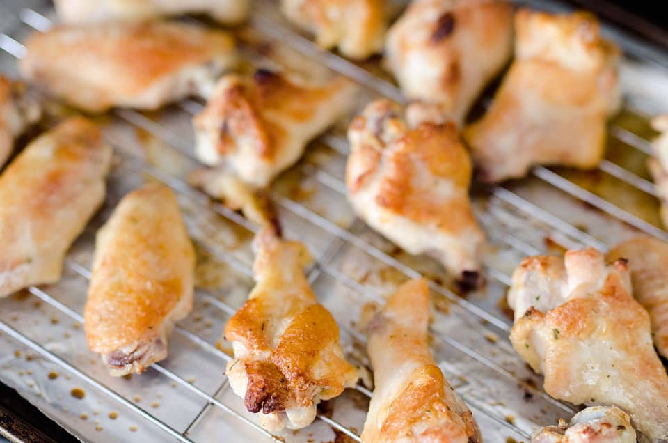 Baked Chipotle Ranch Wings are spicy chicken wings baked to crispy perfection in the oven with a dusting of Hidden Valley Ranch seasoning. These crispy wings are tossed in a delicious chipotle ranch sauce for a a lightened up game day favorite!