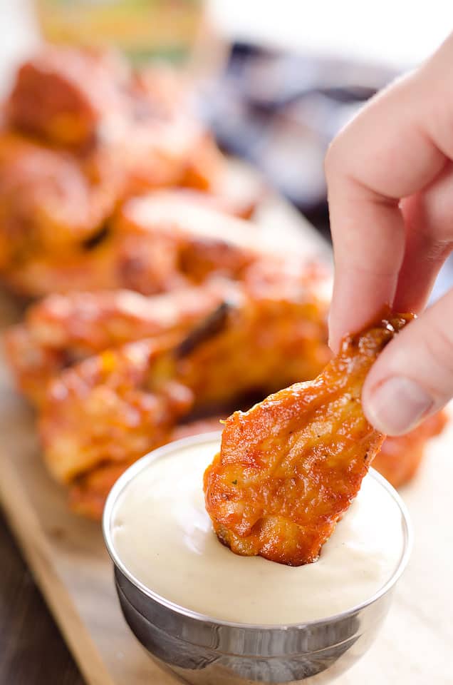 Baked Chipotle Ranch Wings are spicy chicken wings baked to crispy perfection in the oven with a dusting of Hidden Valley Ranch seasoning. These crispy wings are tossed in a delicious chipotle ranch sauce for a a lightened up game day favorite!